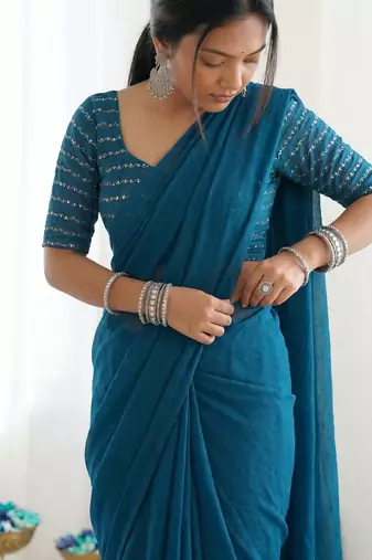 New trendy elegant teal solid saree with embellished blouse