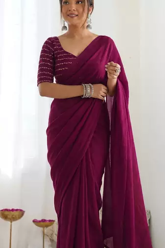 New trendy elegant wine solid saree with embellished blouse