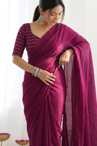 New trendy elegant wine solid saree with embellished blouse