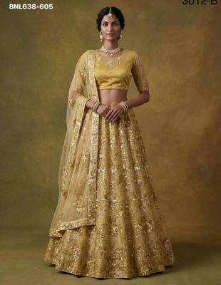 mustard net embroidered lehenga choli 1