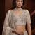 beige net embroidered lehenga choli