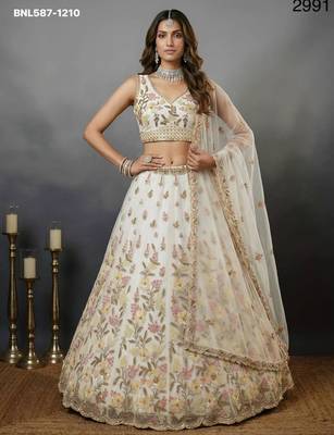cream net embroidered lehenga choli 1