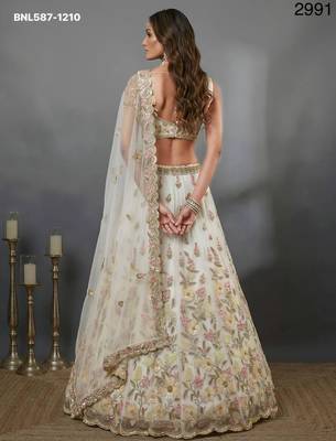 cream net embroidered lehenga choli 2