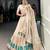 cream art silk printed Onam lehenga choli