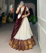 cream art silk woven Onam lehenga choli