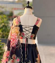 black organza printed  lehenga choli with free size upto 42