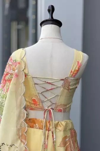 light lemon organza printed  lehenga choli with free size upto 42