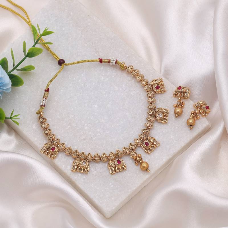 Rani color designer matte gold kundan set