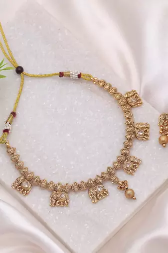Gold color luxury matte gold kundan set