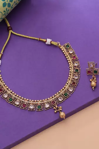 Rani & green color gold kundan set