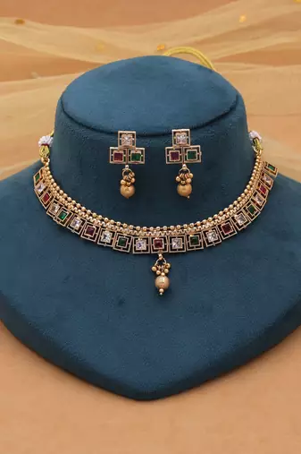 Rani & green color gold kundan set