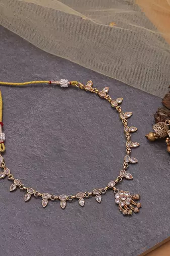 Gold color festive kundan necklace set