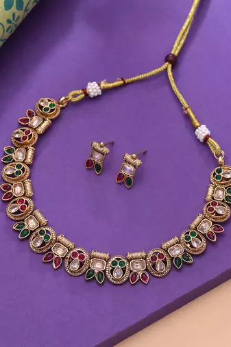 Rani & green color designer kundan set