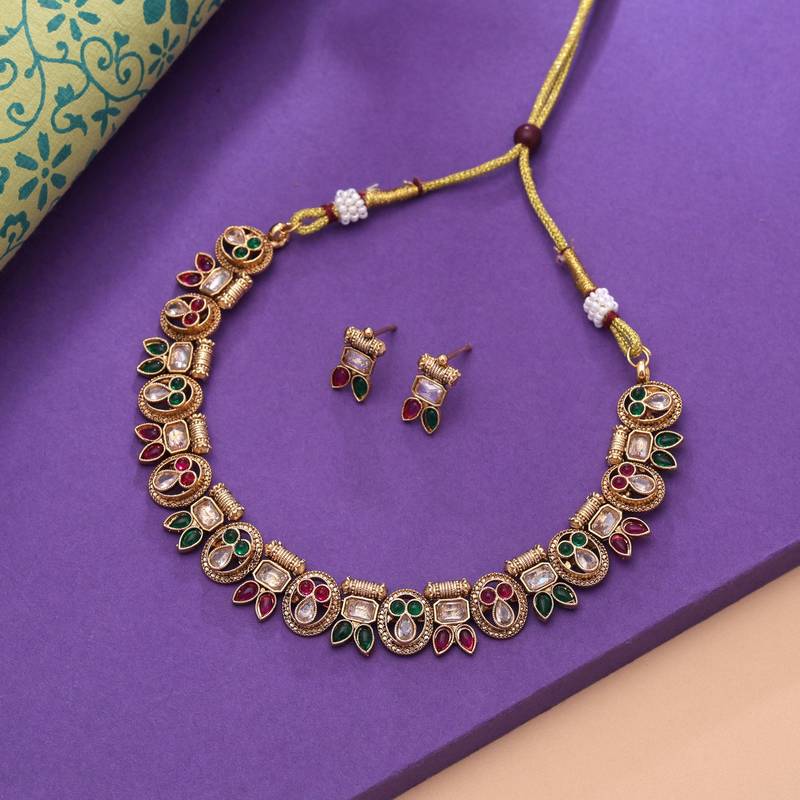Rani & green color designer kundan set