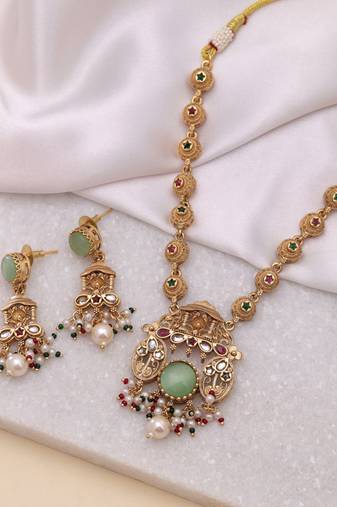 Pista green color matte gold kundan set