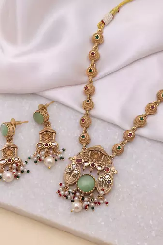 Pista green color matte gold kundan set