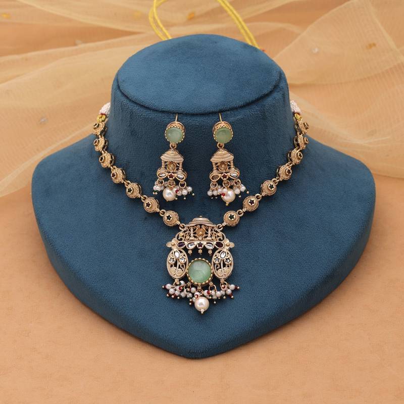 Pista green color matte gold kundan set