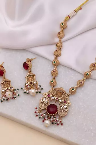 Maroon color matte gold kundan set