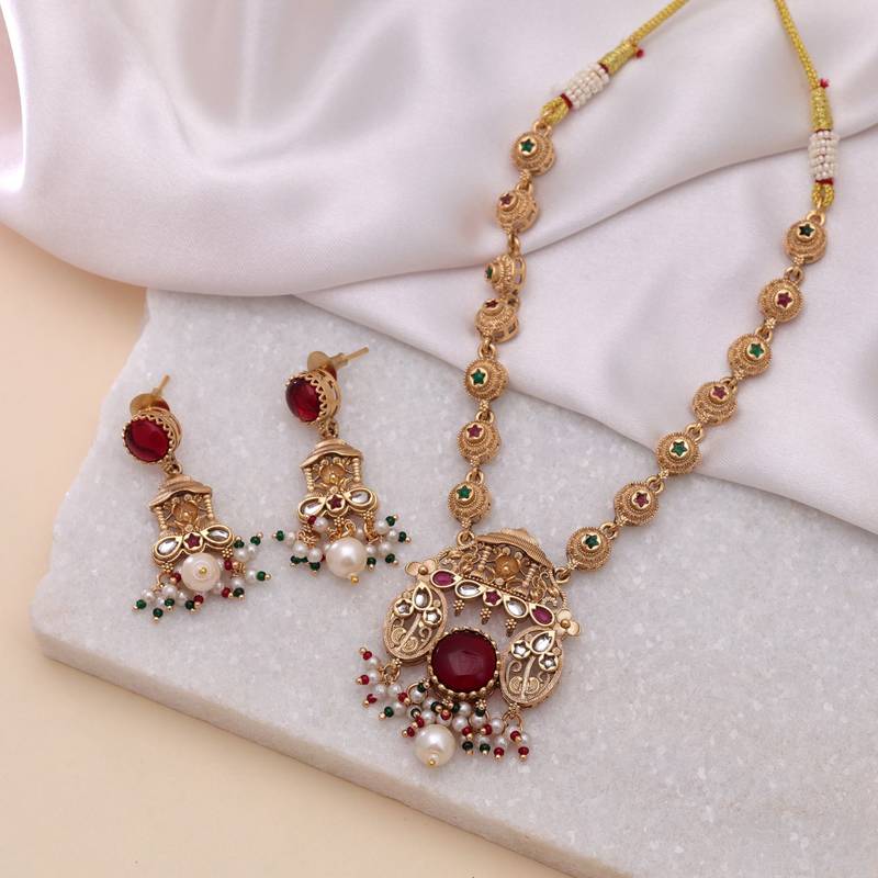 Maroon color matte gold kundan set