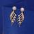 Gold color american diamond earrings