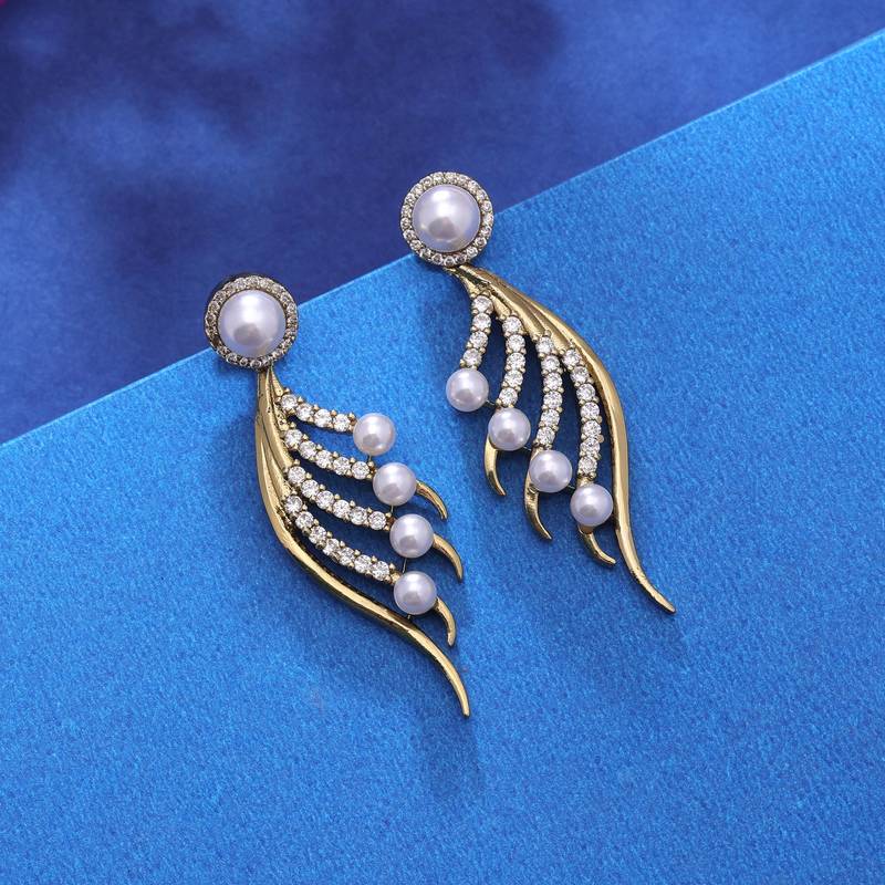 White color american diamond earrings