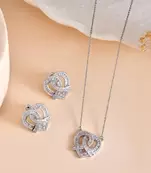 Elegant interlocked heart design with fine stone detailing