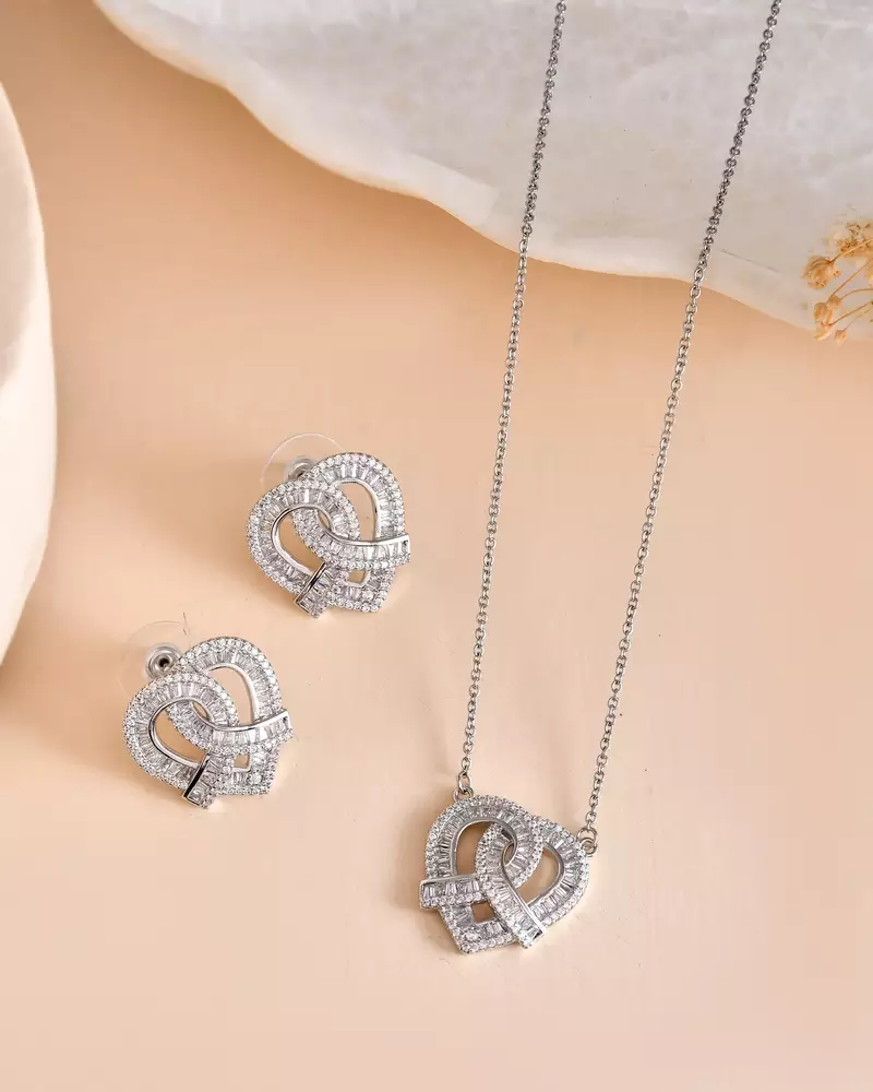 Elegant interlocked heart design with fine stone detailing