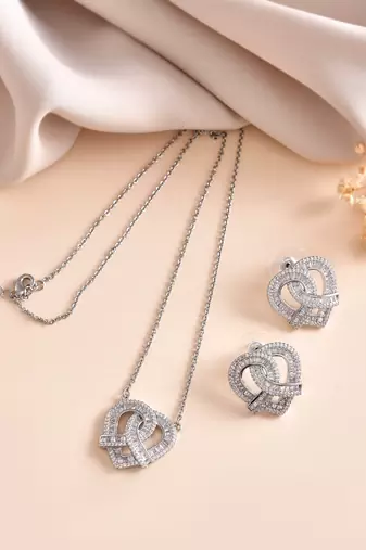 Elegant interlocked heart design with fine stone detailing
