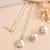 Elegant gold plated round pendant chain with stud earrings set for women
