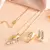 Elegant gold-tone crystal curve pendant/chain set for women