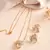 Gold leaf pendant chain with crystal detailing
