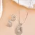 Luxury teardrop diamond pendant  set in silver finish with matching earrings