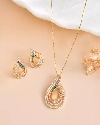Luxury teardrop diamond pendant  set in gold finish with matching earrings 2