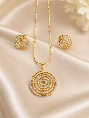Golden spiral stone pendan with matching earrings for women 1