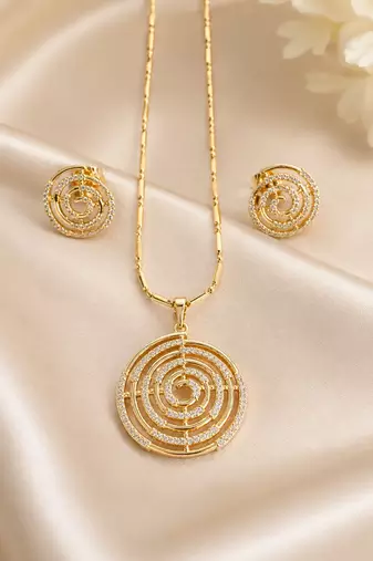 Golden spiral stone pendan with matching earrings for women