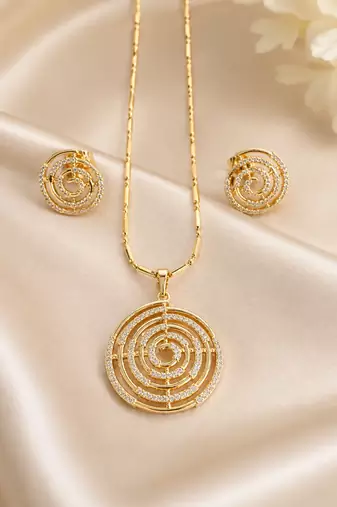 Golden spiral stone pendan with matching earrings for women