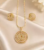 Golden spiral stone pendan with matching earrings for women