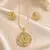 Golden spiral stone pendan with matching earrings for women