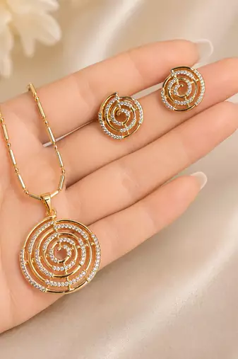 Golden spiral stone pendan with matching earrings for women