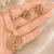 Golden spiral stone pendan with matching earrings for women