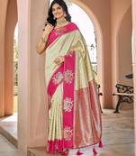 Designer banarasi cream silk saree elegant gold zari work with contrast pink border wedding reception party wear saree