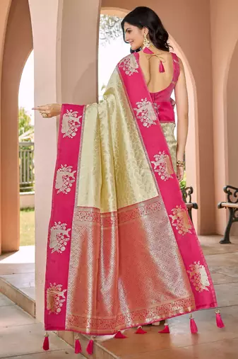 Designer banarasi cream silk saree elegant gold zari work with contrast pink border wedding reception party wear saree