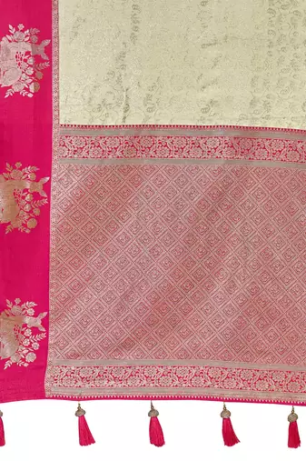 Designer banarasi cream silk saree elegant gold zari work with contrast pink border wedding reception party wear saree