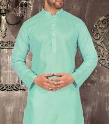 Orange cotton kurta with pattern work and fancy button churidar