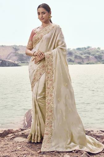 Off white satin silk with designer blouse wedding wear saree