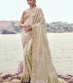 Off white satin silk with designer blouse wedding wear saree