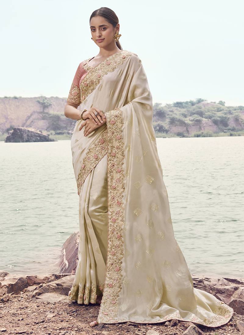 Off white satin silk with designer blouse wedding wear saree
