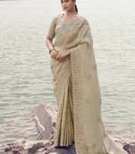 Beige tissue silk with jaquard with designer blouse wedding wear saree