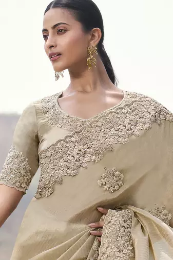 Beige tissue silk with jaquard with designer blouse wedding wear saree