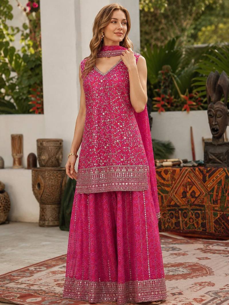 Rani pink faux georgette semi stitched suit with embroidery  & sequence work